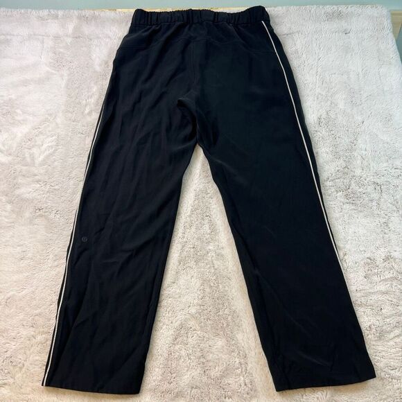 Lululemon On The Right Track Womens Pants Black Loose Fit Slit Hem Size 10 - Picture 10 of 11